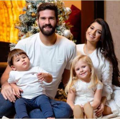Magali Lino De Souza Becker's son Alisson Becker with his wife Natalia Loewe and children Helena and Matteo Becker